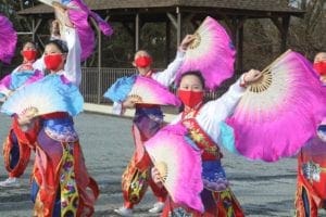 The Chinese American Community Center dancers will use silk fans, flower balls and a dragon to perform.