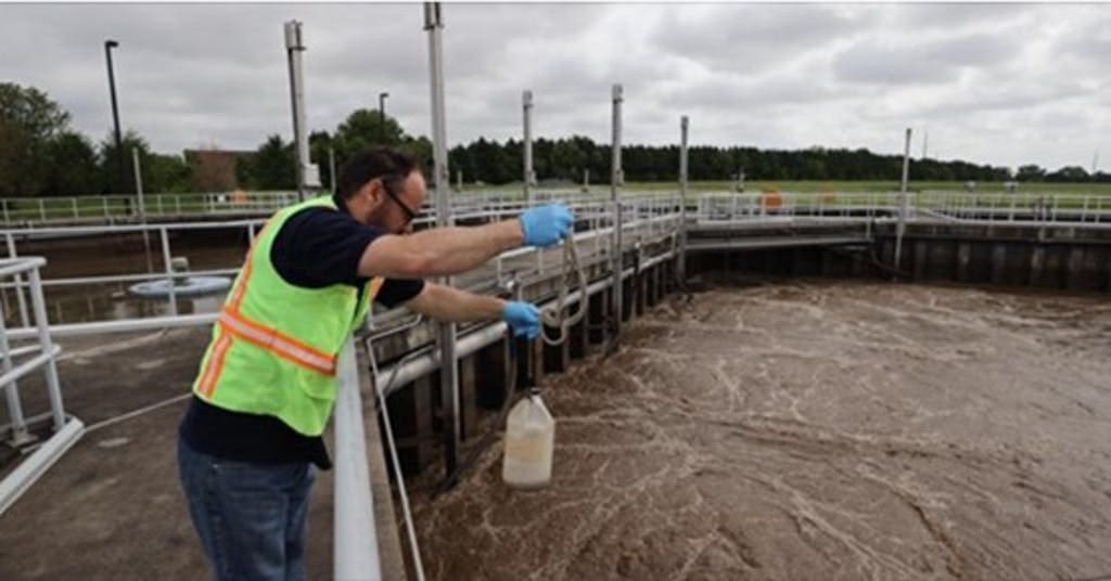 A New Castle County worker grabs samples from the Middletown-Odessa-Townsend treatment plant.