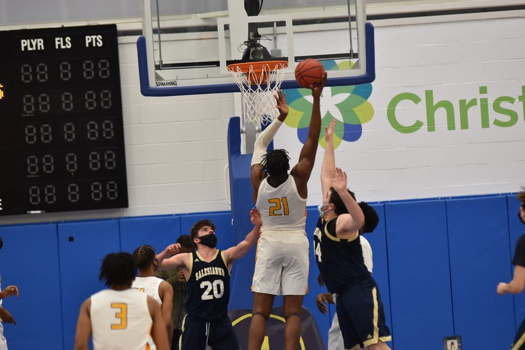 Nnanna Njoku goes up for a score against Salesianum.