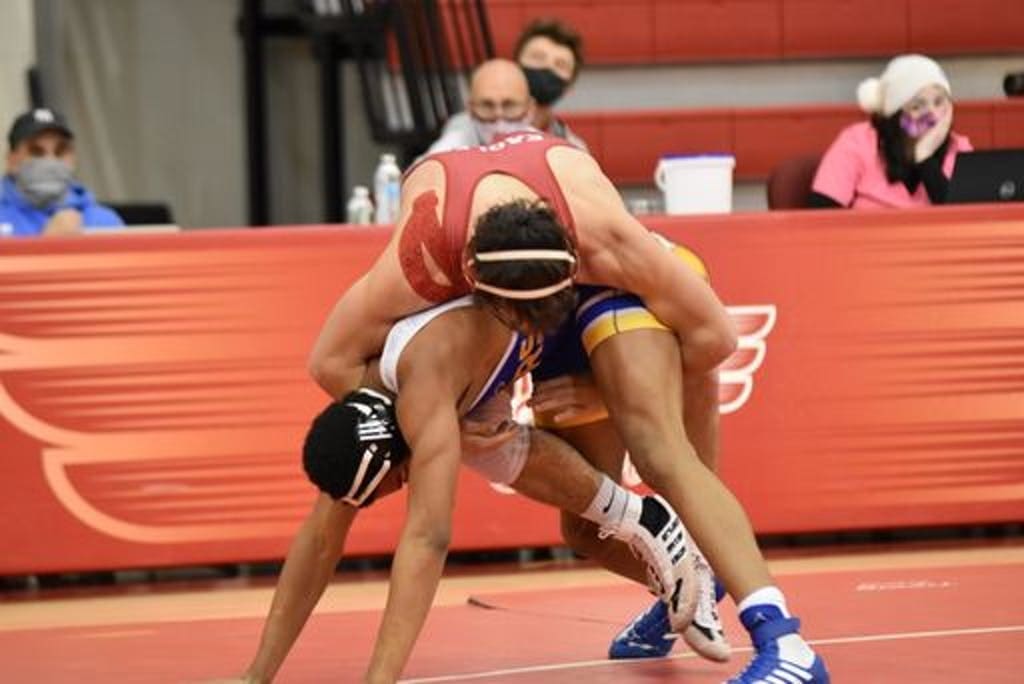 Nathan Lesniczak. in red, got one of the Smyrna's pins that powered their win against Caesar Rodney.
