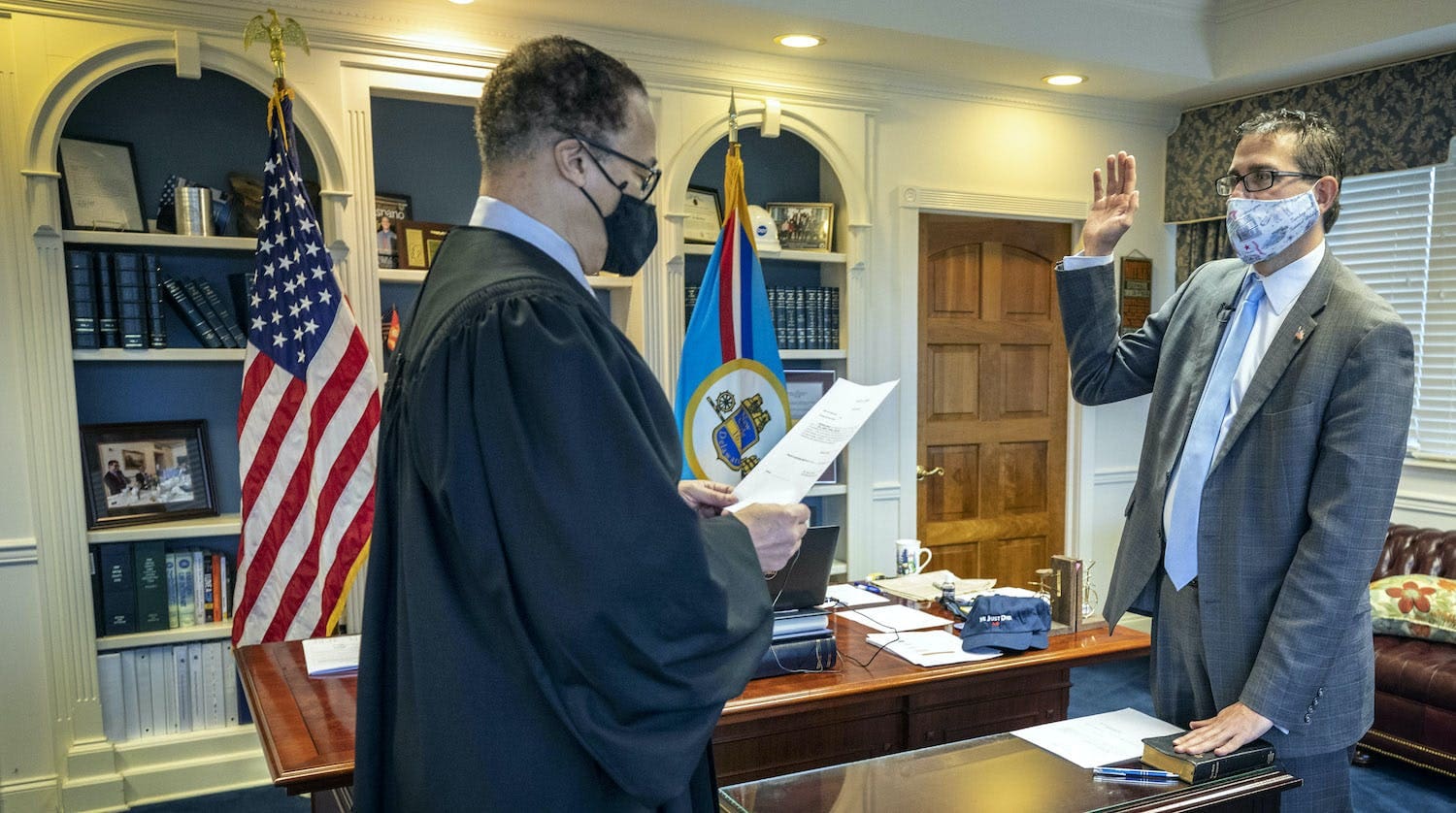 Matt Meyer being sworn in