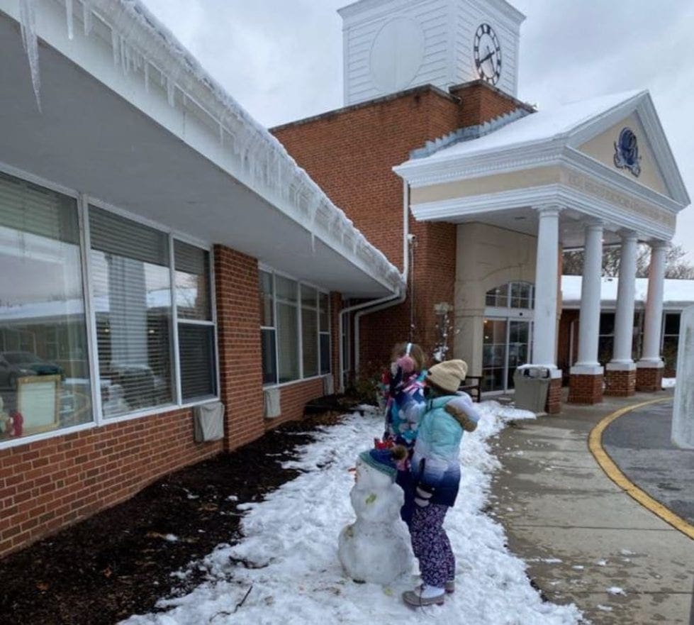 About a dozen kids answered a call to build snowmen at Regal Heights Nursing Home