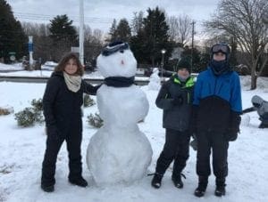 These three answered the call for kids to build snowmen for a Hockessin nursing home.