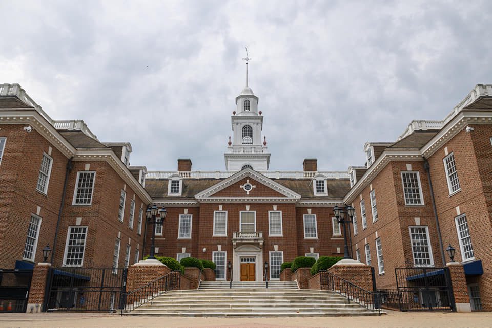 a large brick building with Delaware Legislative Hall in the background