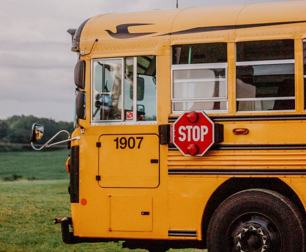 a school bus parked in a field