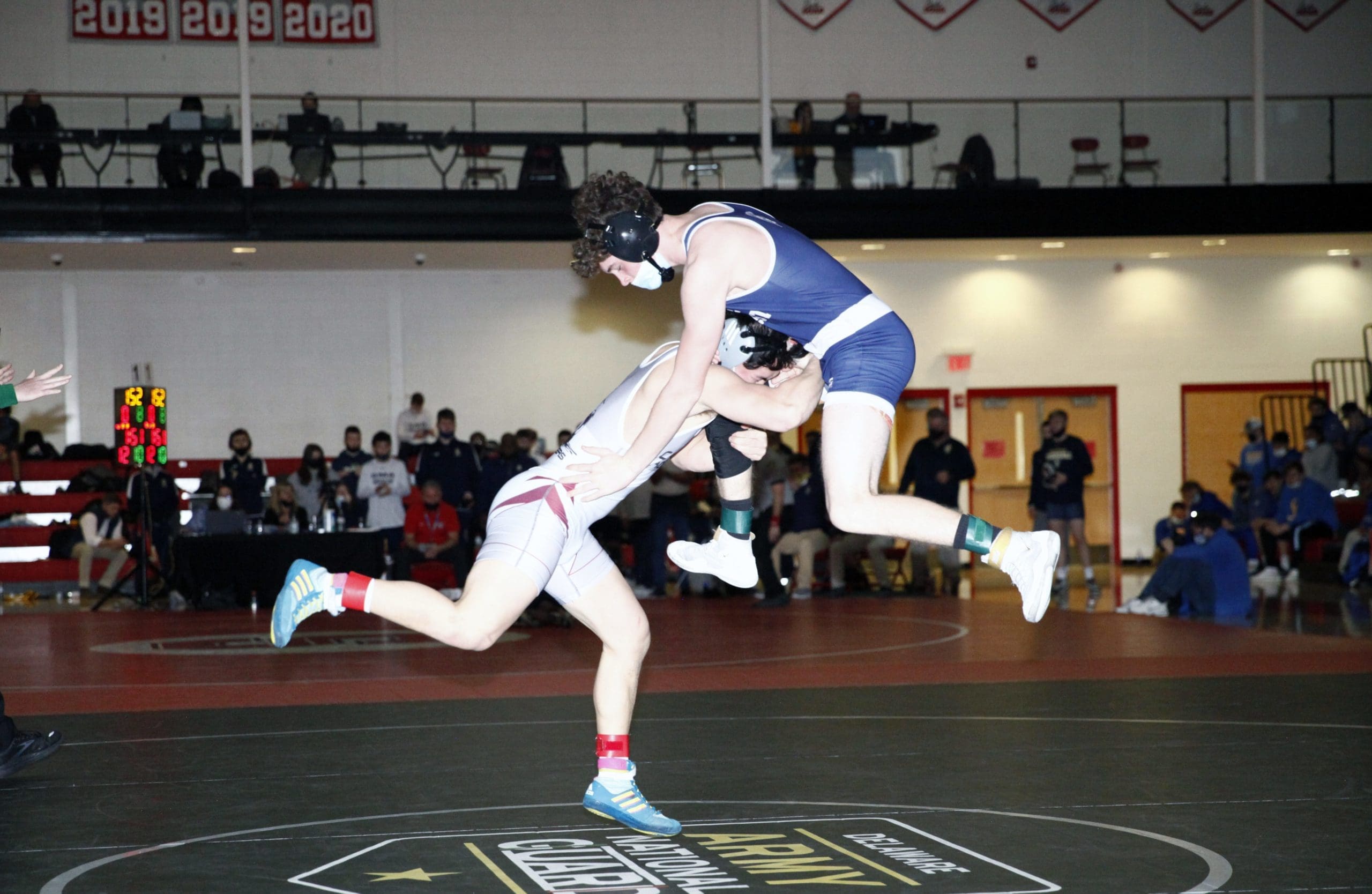 Featured image for “Caravel Academy rolls into state dual finals”