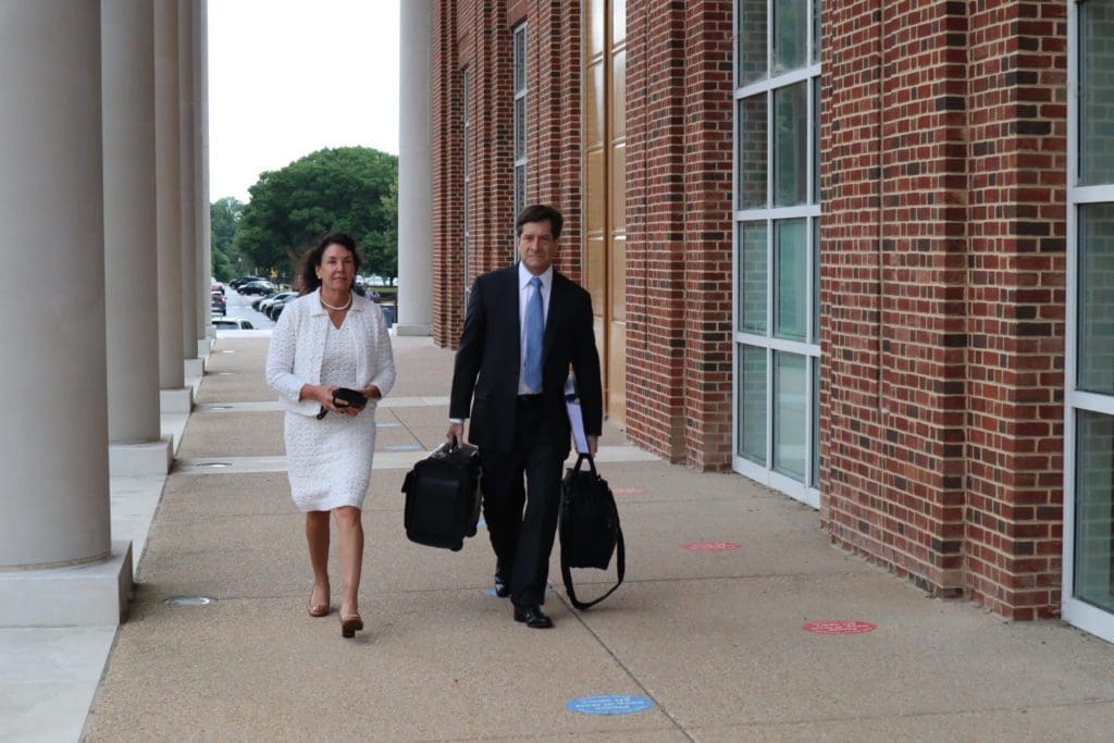 Delaware State Auditor Kathy McGuiness enters Kent County Courthouse.