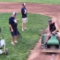 After three nights of heavy rain the Milton field crew readies the field for play photo by Benny Mitchell
