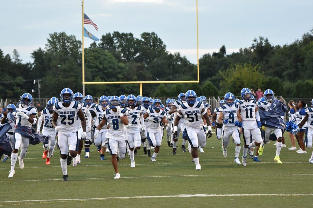 Middletown Football team running out on the field photo by Donnell Henriquez 1
