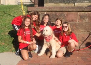 Winnie, Ursuline Academy's new school therapy dog, met students Wednesday.