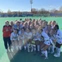 Delmar Field Hockey posing with the state championship trophy photo by Nick Halliday