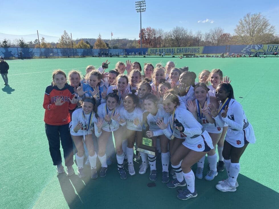 Delmar Field Hockey posing with the state championship trophy photo by Nick Halliday