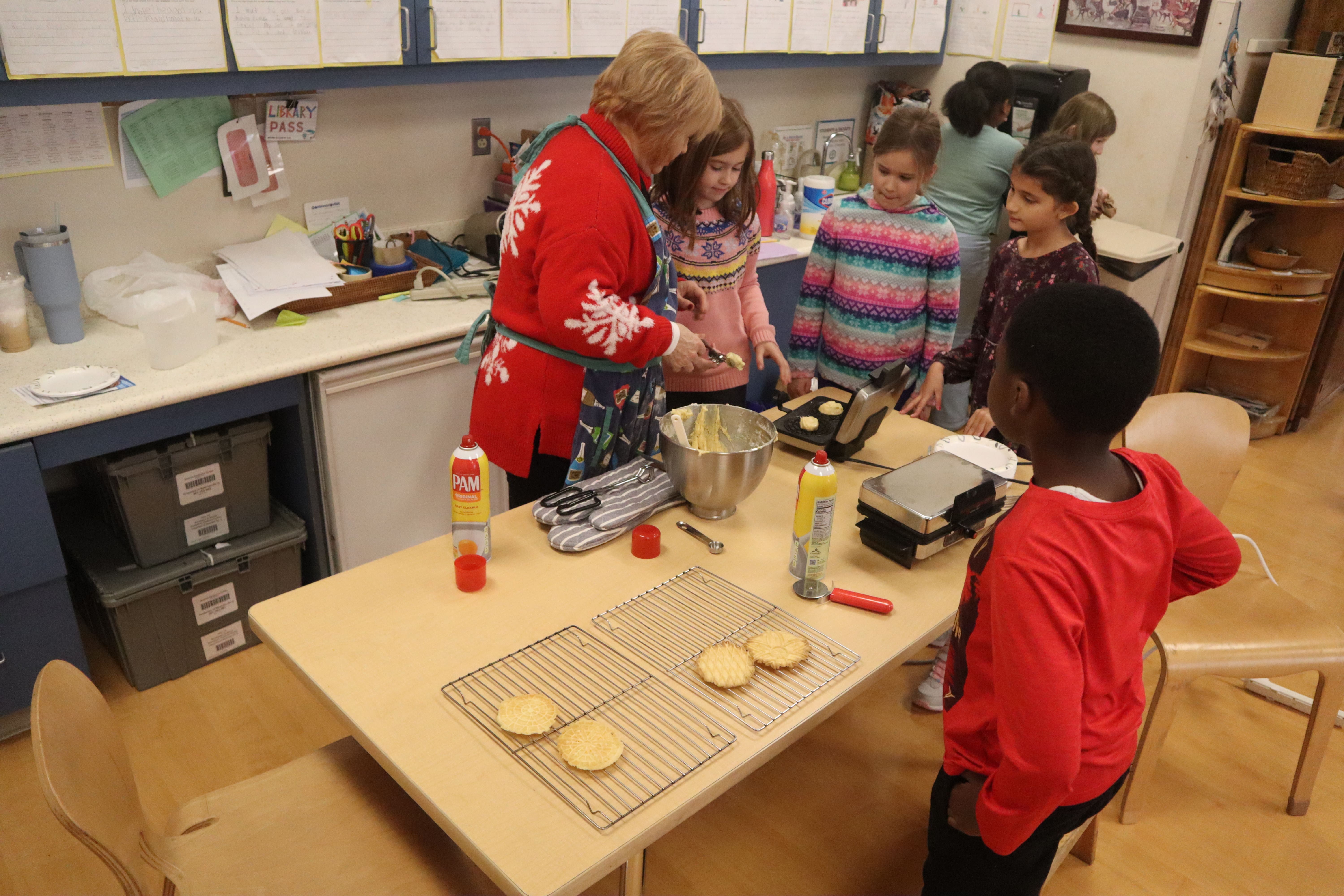 Some of First State Montessori's second- and third-graders made Italian pizzelles to eat and donate to a Downtown Visions. (Jarek Rutz/Delaware LIVE News)