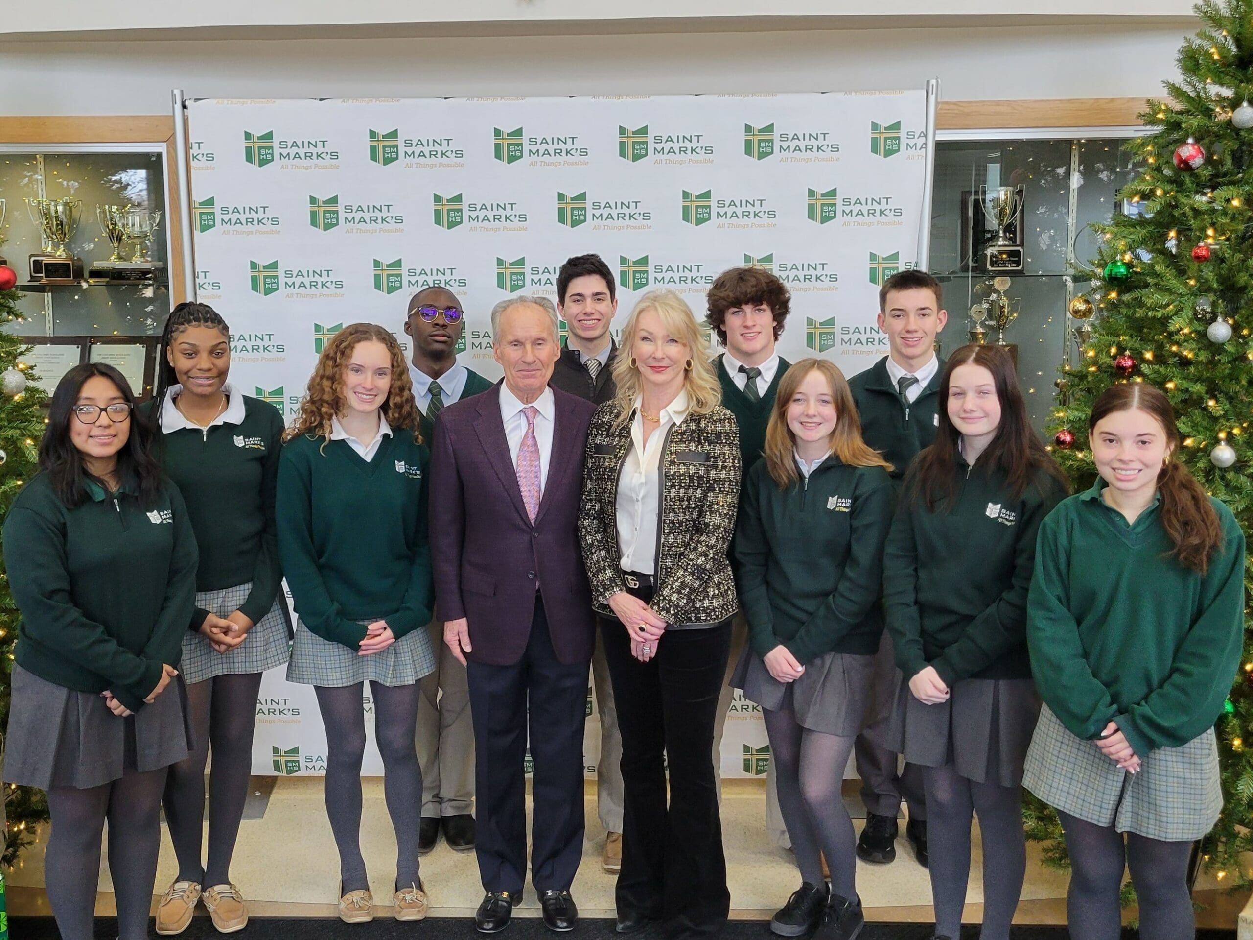 Paul and Linda McConnell with students from St. Mark's. 