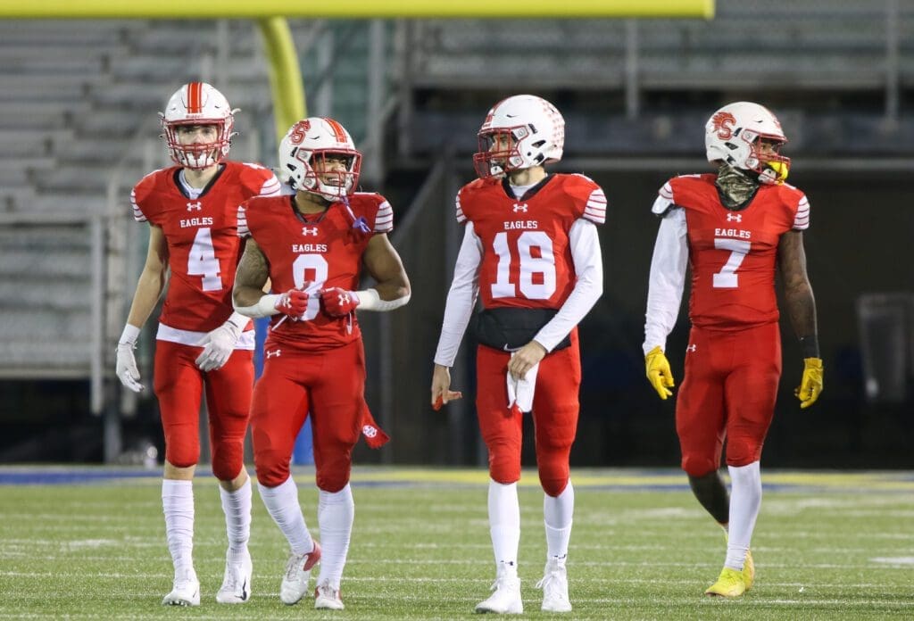 Smyrna Football players Nolan Fretz 4 Yamir Knight 80 Brian Wright 18 Markell Holman 7 during the 3A championship game photo by Donnell Henriquez