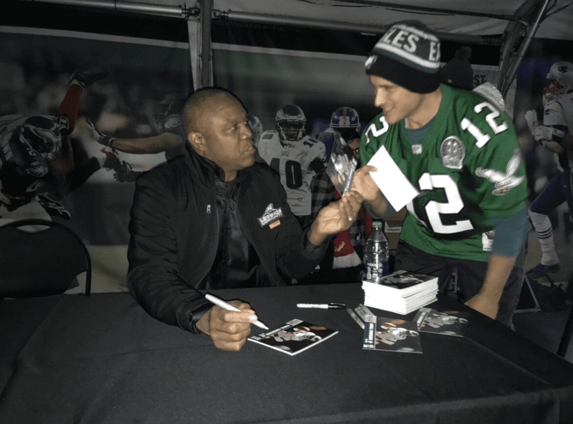 Matt Aurbach, right, meeting his favorite Eagles player, retired quarterback Randall Cunningham.