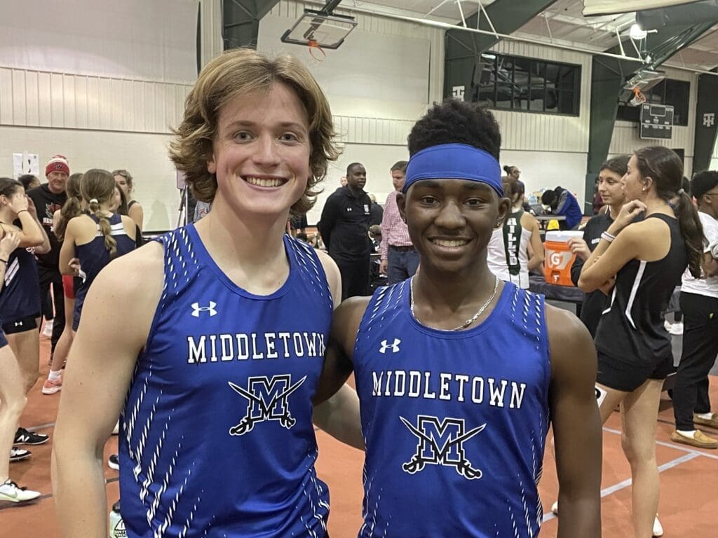 Middletown runners Jonas Rush left and Walter Samuels right . Rush finished first and Samuels second in the 1600 meters photo by Glenn Frazer 3