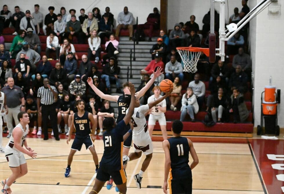 Caravel basketball Dominique Wyatt making a layup against Sanford photo by Nick Halliday 2