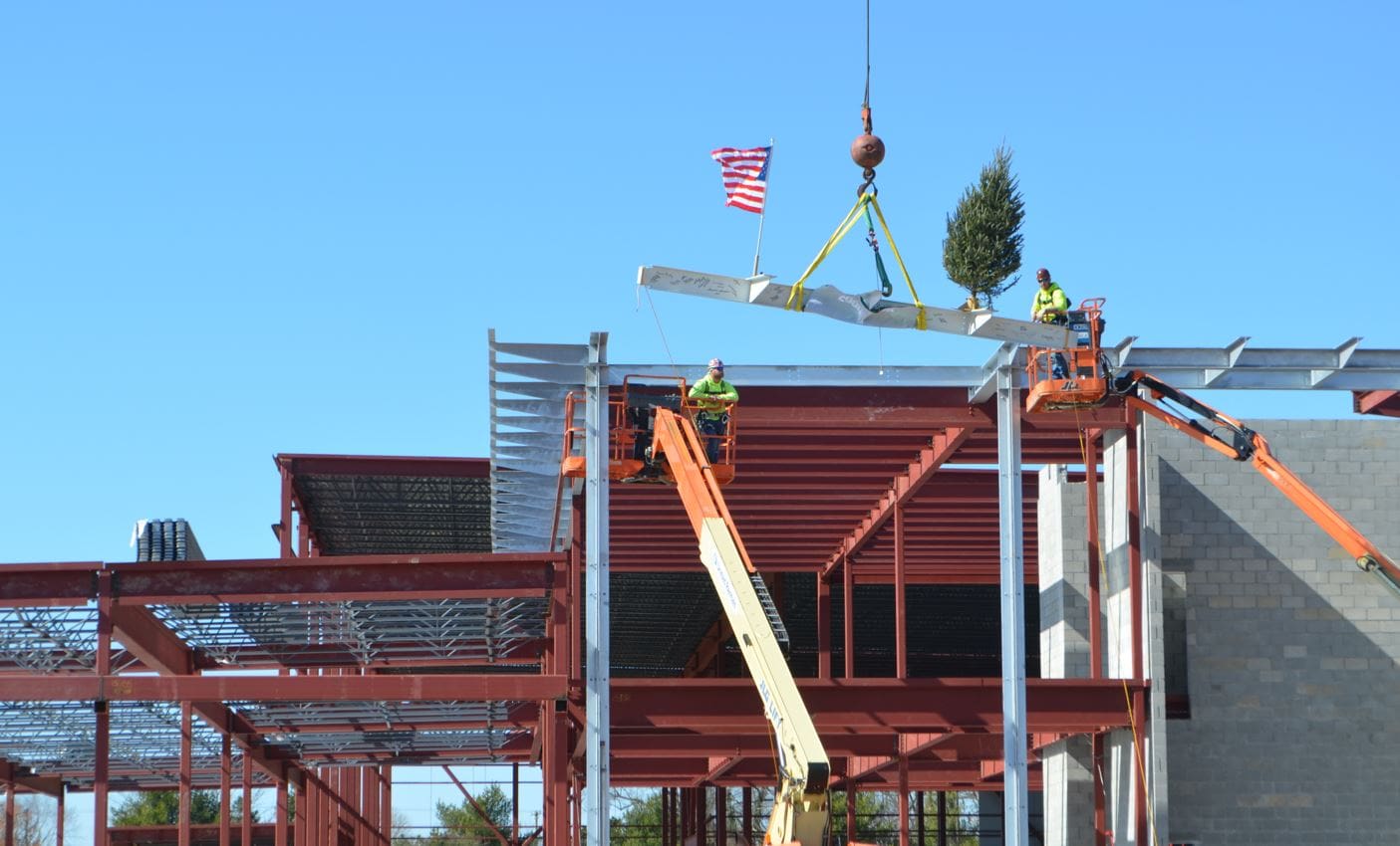 Featured image for “Food Bank celebrates topping off new Milford building”