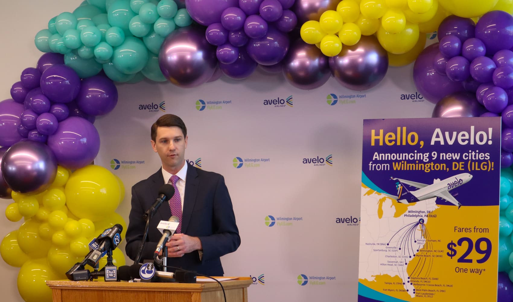 Trevor Yealy, head of Avelo's strategy & planning, announces the airline's expansion at ILG. (Jarek Rutz/Delaware LIVE News)