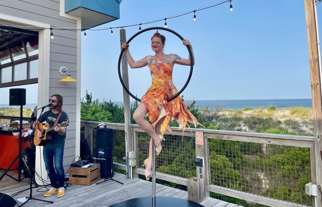 A circus performer on a suspended ring added panache to La Vida Hospitality's kickoff for its Celebrate Wellness initiative.