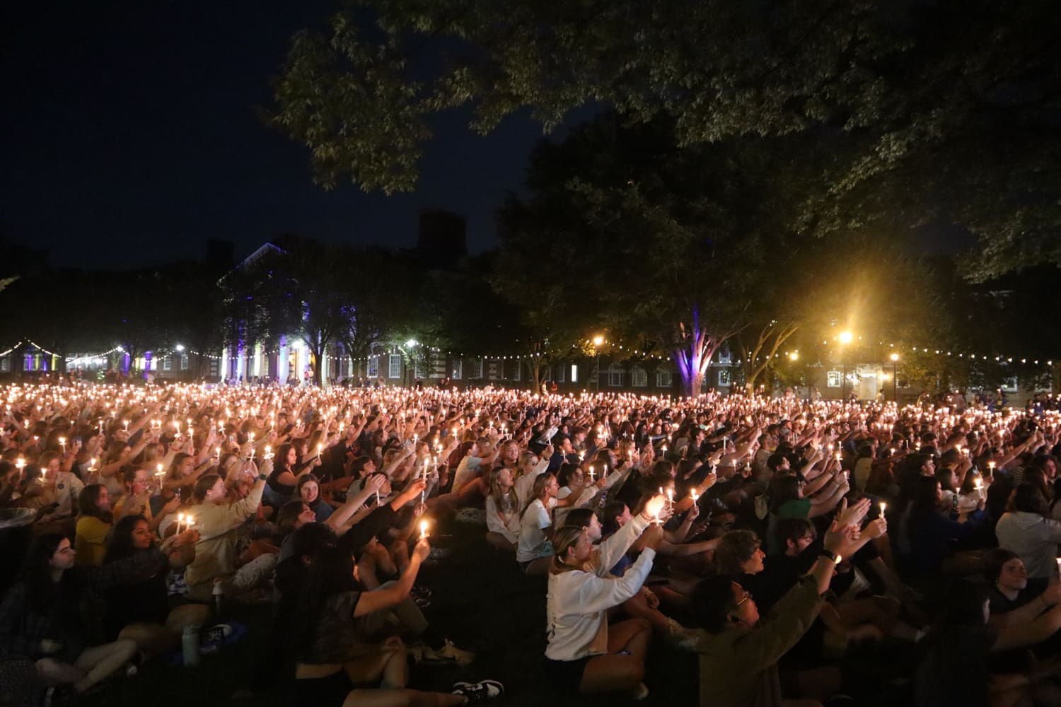 Featured image for “UD’s 4,000 freshmen light up night with twilight tradition ”
