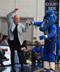 Delaware Blue Coats mascot dances with a fan duing a game Photo courtesy of Ben Fulton