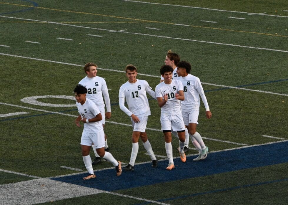 Salesianum soccer Gianluca Maronni celebrates with is teammates after scoring a goal in the state championship photo courtesy of Nick Halliday