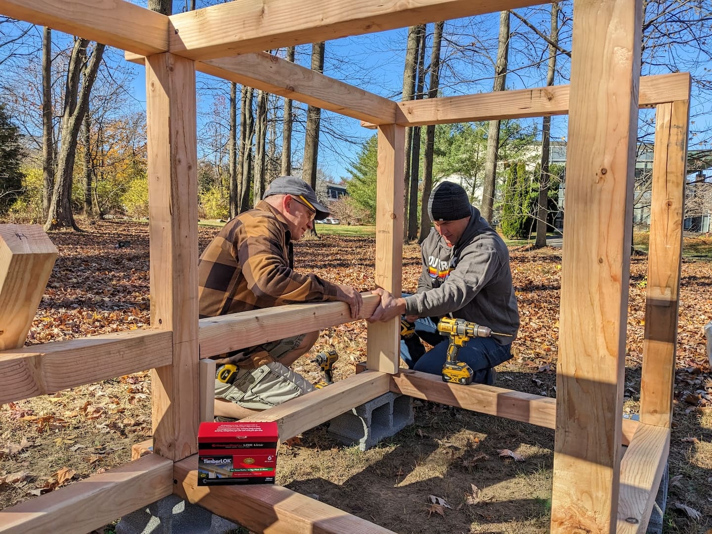 Jeff Towler, recruited through the Delaware Woodworks Guild, and his friend Keith Stengel help create bins for the Delaware Community Composting Initiative. (Ken Mammarella photo).