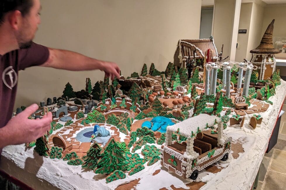 Irv Boyd helps finish a gingerbread version of Winterthur’s Enchanted Woods for Yuletide at Winterthur. (Ken Mammarella photo)