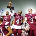 Caravel football poses with the trophy after winning the DIAA 2A football state championship photo courtesy of Donnell Henriquez
