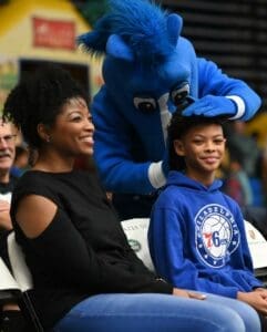 Delaware Blue Coats mascot acts like hes cutting a fans hair photo courtesy of Ben Fulton