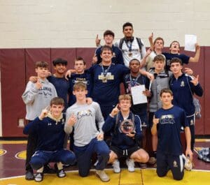 Delaware Military wrestling team poses after winning the Milford Invitational wrestling championship photo courtesy of DMA Athletics Twitter page 1