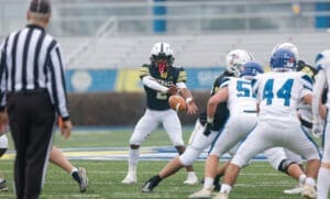 Tatnall football RahShan LaMons takes the snap during the DIAA 1A football state championship photo courtesy of Donnell Henriquez