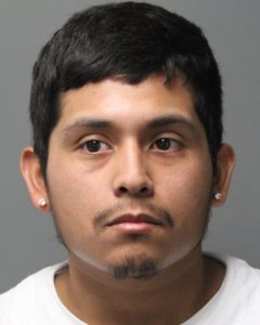 Lester Alcantara mugshot photo with gray background