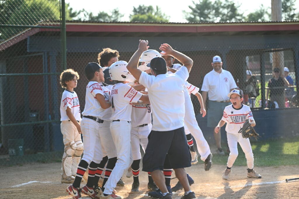 Brandywine, Naamans get walk off wins to advance 3 Brandywine Little League majors all stars mob Nolan Giles after hitting a walk off homerun to win the game. Photo by Nick Halliday