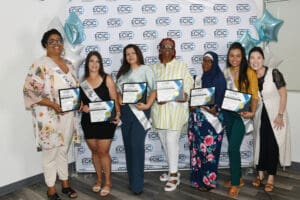 DSU's ECIC higher education graduates, from left: Ayesha Jamison, Michelle Spangler, Luz Quiroga, Evelyn Cubbage, Patrice Jones Cornish, Julissa Valerio and ECIC Scholarship Coordinator Jennifer Seo.