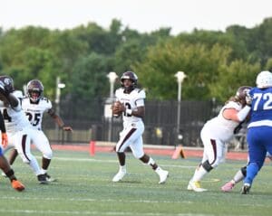 Appoquinimink football Desai Drummond threw 5 touchdown passes and ran for another in their win over Dover. Photo by Ben Futon