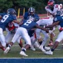 Lake Forest defenders Andrew White 2 and RaeKwon Sullivan 52 stop Red Lion running back Mehki Corbin short of the endzone. Photo by DarJuan Pitts