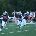 Newark Charter football Jace Miller 26 looks upfield after taking the handoff. Photo by Nick Halliday