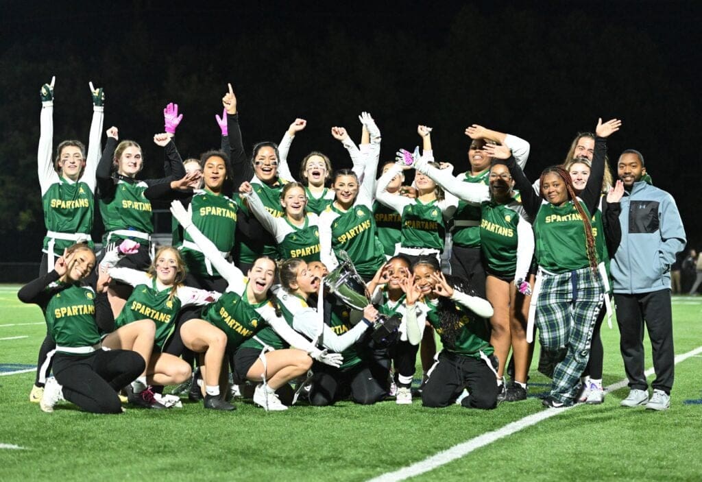 Saint Mark’s wins flag football championship on last-second TD over Padua 3 Saint Marks girls flag football team poses with the championship trophy. Photo by Ben Fulton