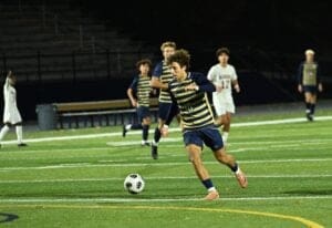 Salesianum Cifa dribbels the ball up field in their win over Caesar Rodney. Photo by Nick Halliday