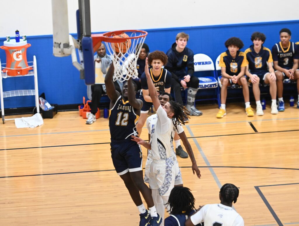 Sanford spoils Howard's celebration of Coach Joe Hussey in overtime, 62-54 3 Sanford boys basketball Khareem Hart scored 15 points in the victory over Howard. Photo by Nick Halliday