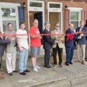 The Sunday Breakfast Mission celebrated the dedication of two newly rehabilitated homes developed in partnership with Habitat for Humanity of New Castle County. (Photo by Carol Houseal)